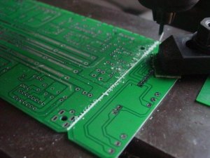 Circuit board undergoing V-cutting