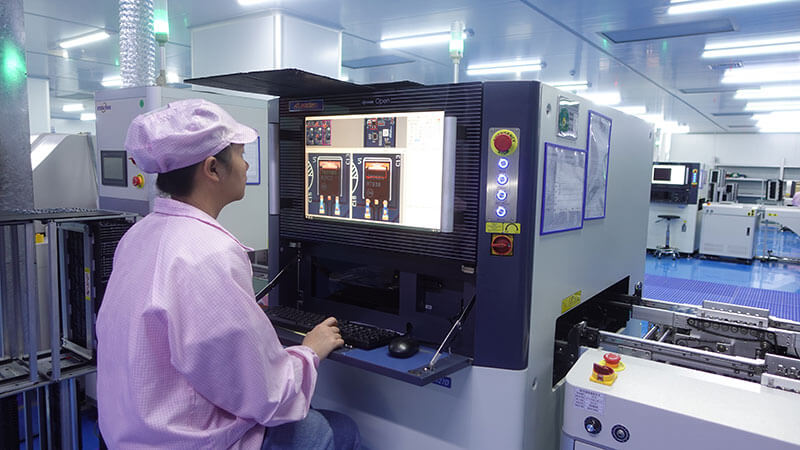 The-quality-inspector-is-using-AOI-inspection-equipment-to-inspect-PCB